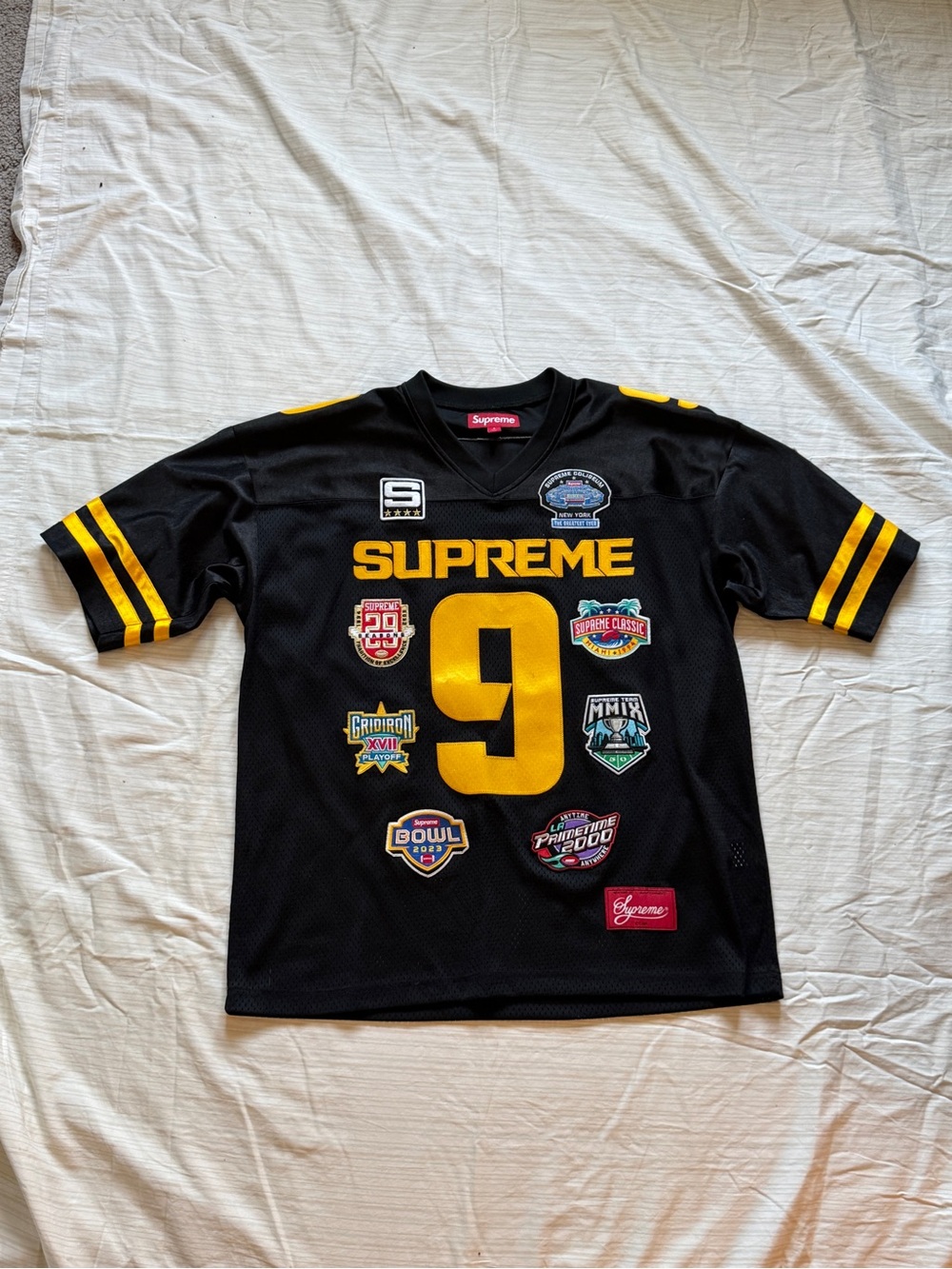 Supreme FW23 black mesh Championships Embroidered Football Jersey size S
